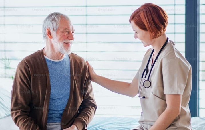 Cardio-HART patient consultation – early detection in primary care. Doctor consulting with patient during Cardio-HART early heart disease screening.