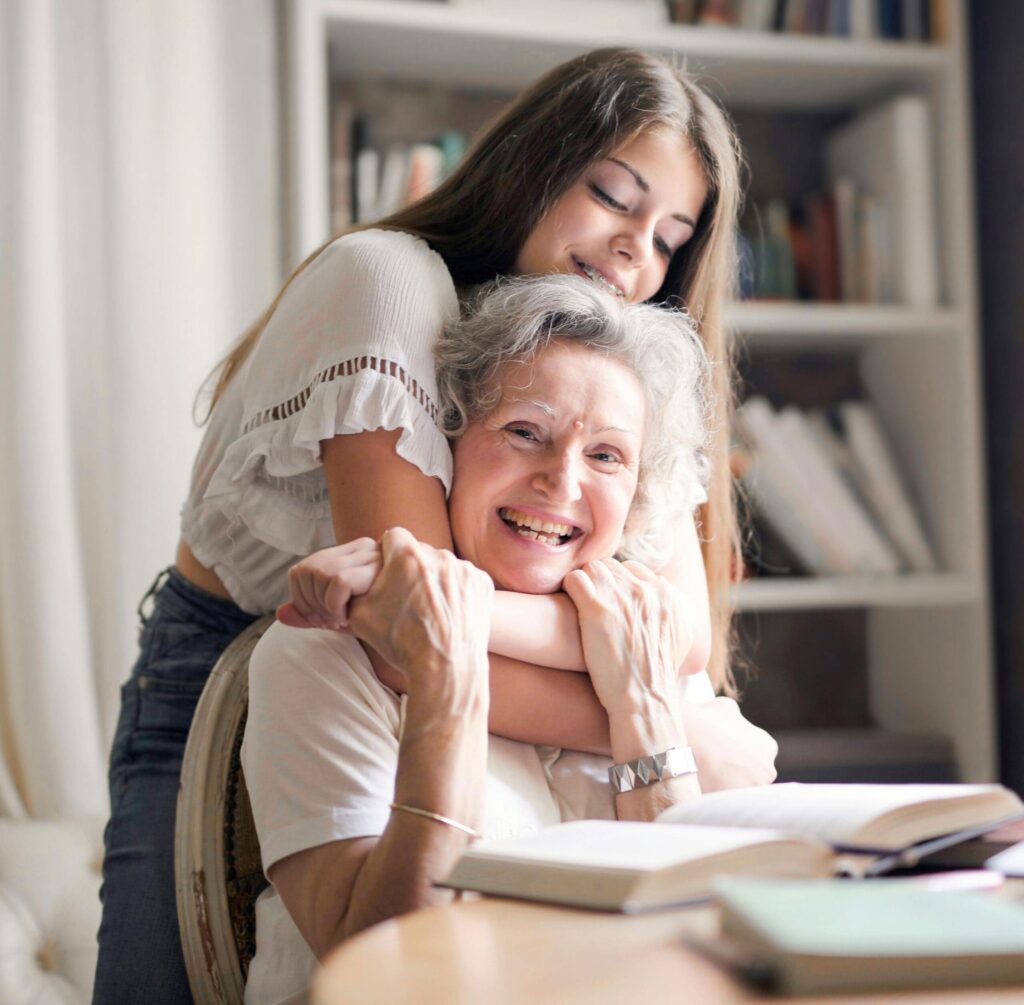Cardio-HART for commissioners – patient-centred family care Grandmother and granddaughter smiling together, showing patient-centred care with Cardio-HART for commissioners